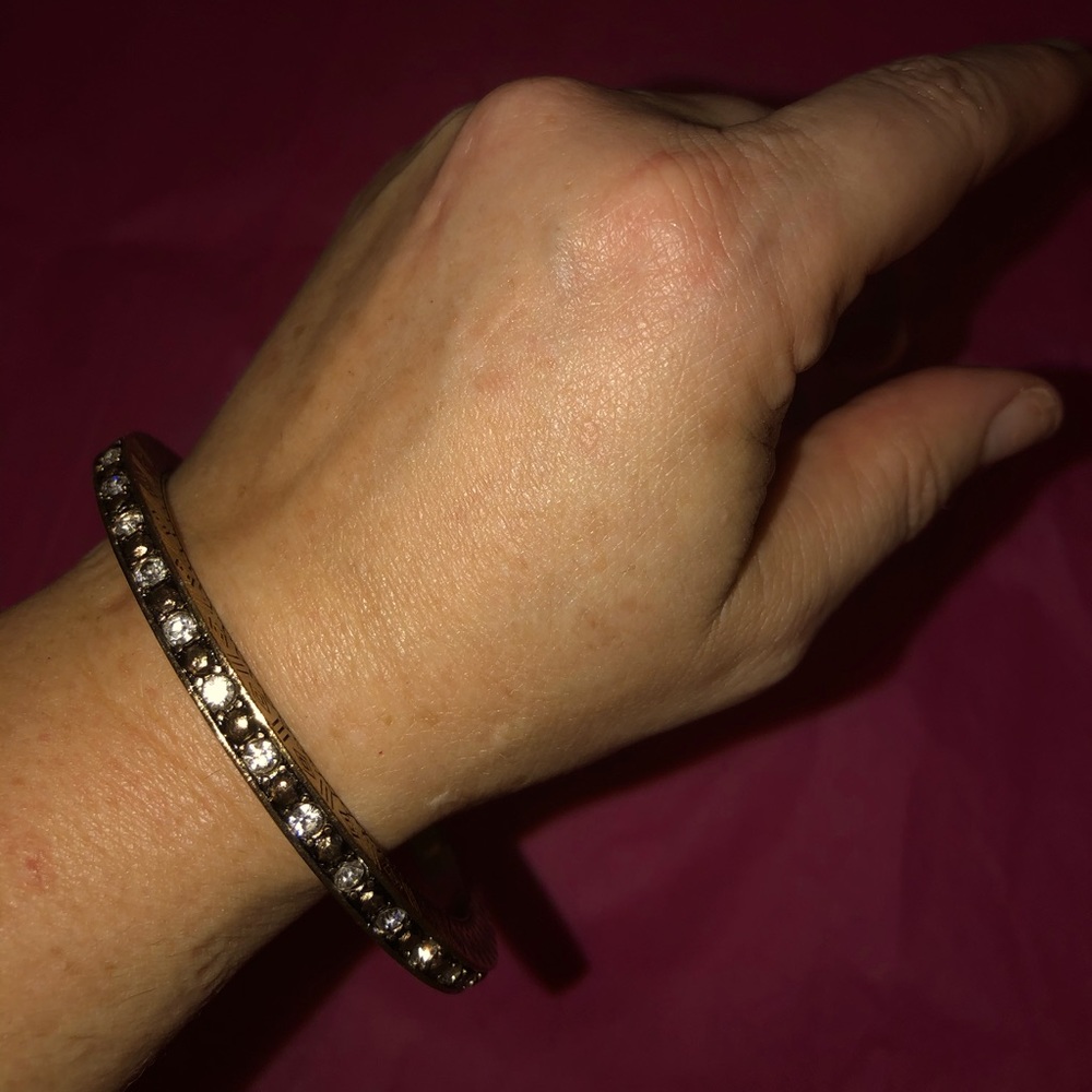 Juicy Couture detailed bangle.Gold/white crystals